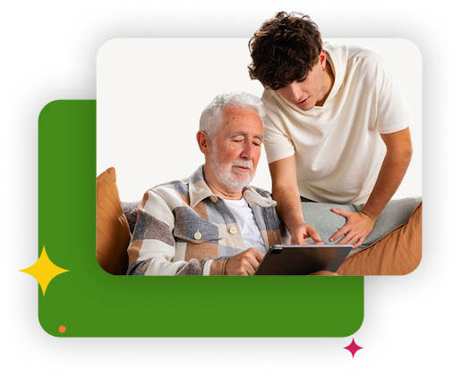 A younger caregiver or family member assisting an elderly man with a digital tablet.